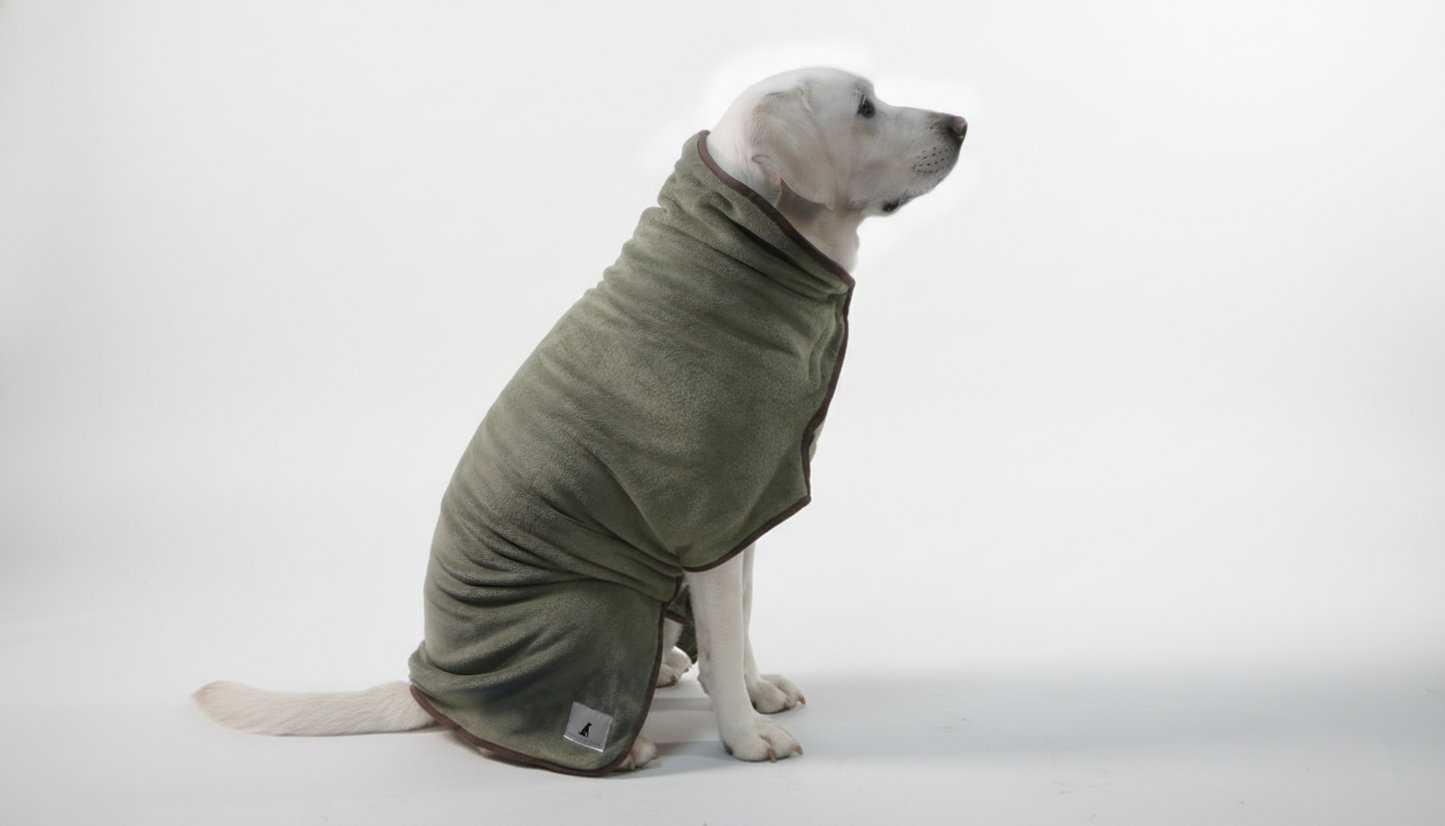 Luke wearing a green coat in a studio white background